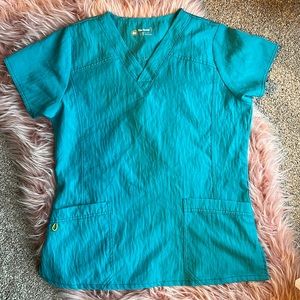 Wink scrub top. Crinkle look. Size M.